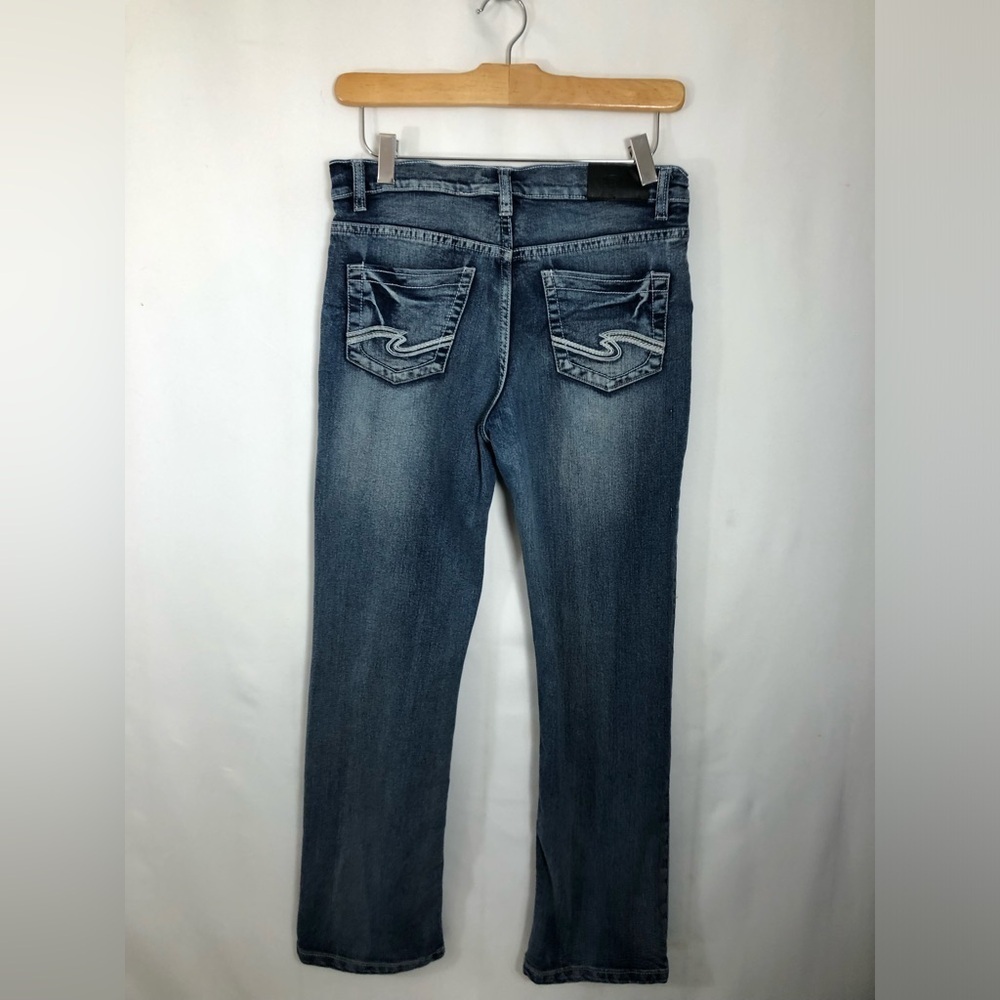 Girls Silver Jeans. 30/26. Has adjustable elastic band waist .